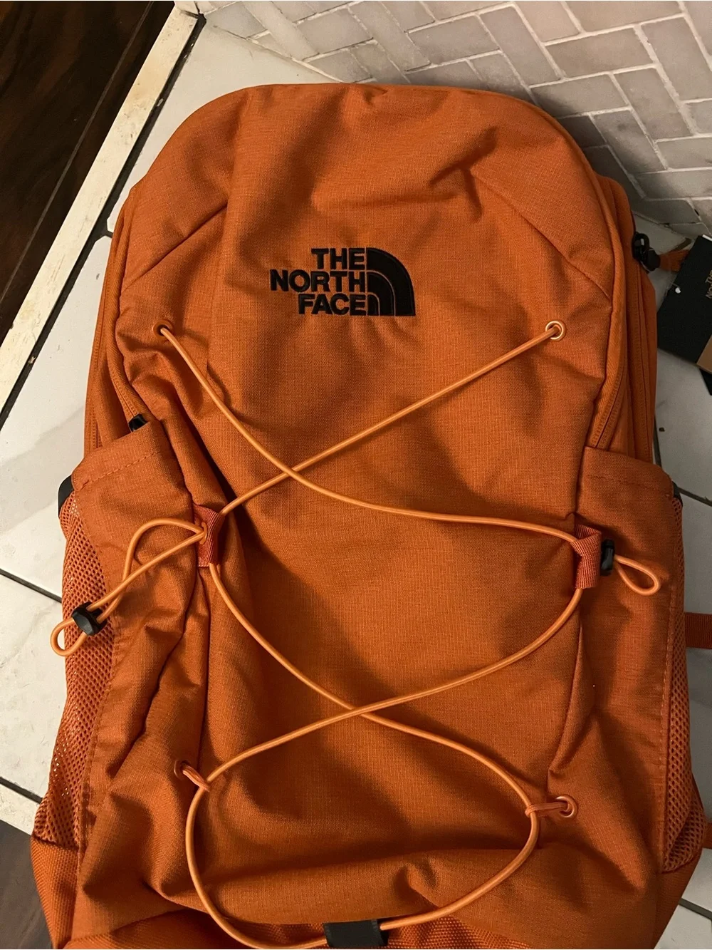 The North Face bold orange